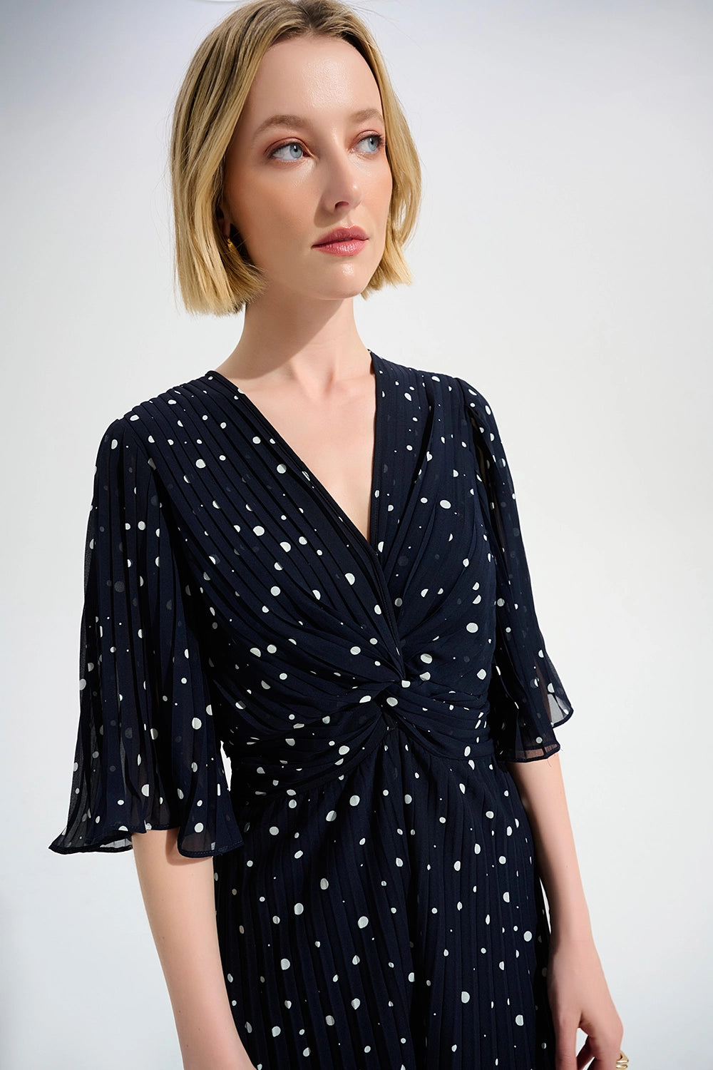 Joseph Ribkoff Signature | Pleated Chiffon Dot Print Wide Leg Jumpsuit With Knot Detail Jr261756